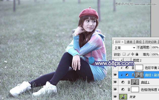 Photoshop调出草地清纯女孩蓝色艺术效果